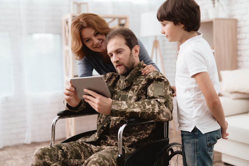 wounded veteran with his family